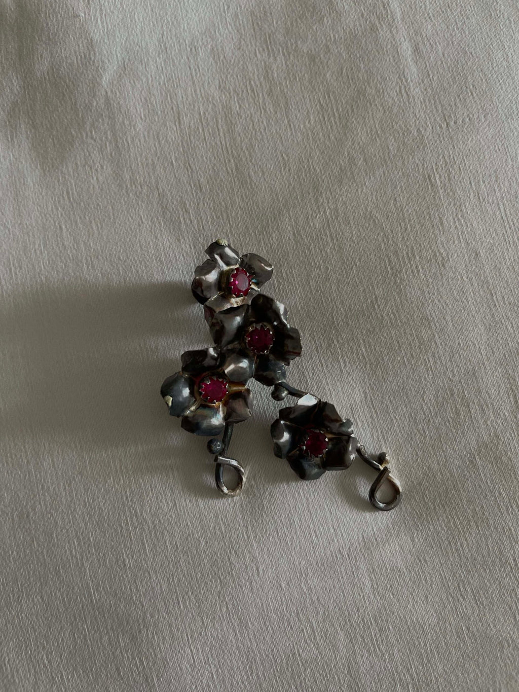 Silver earrings with red stones image 1