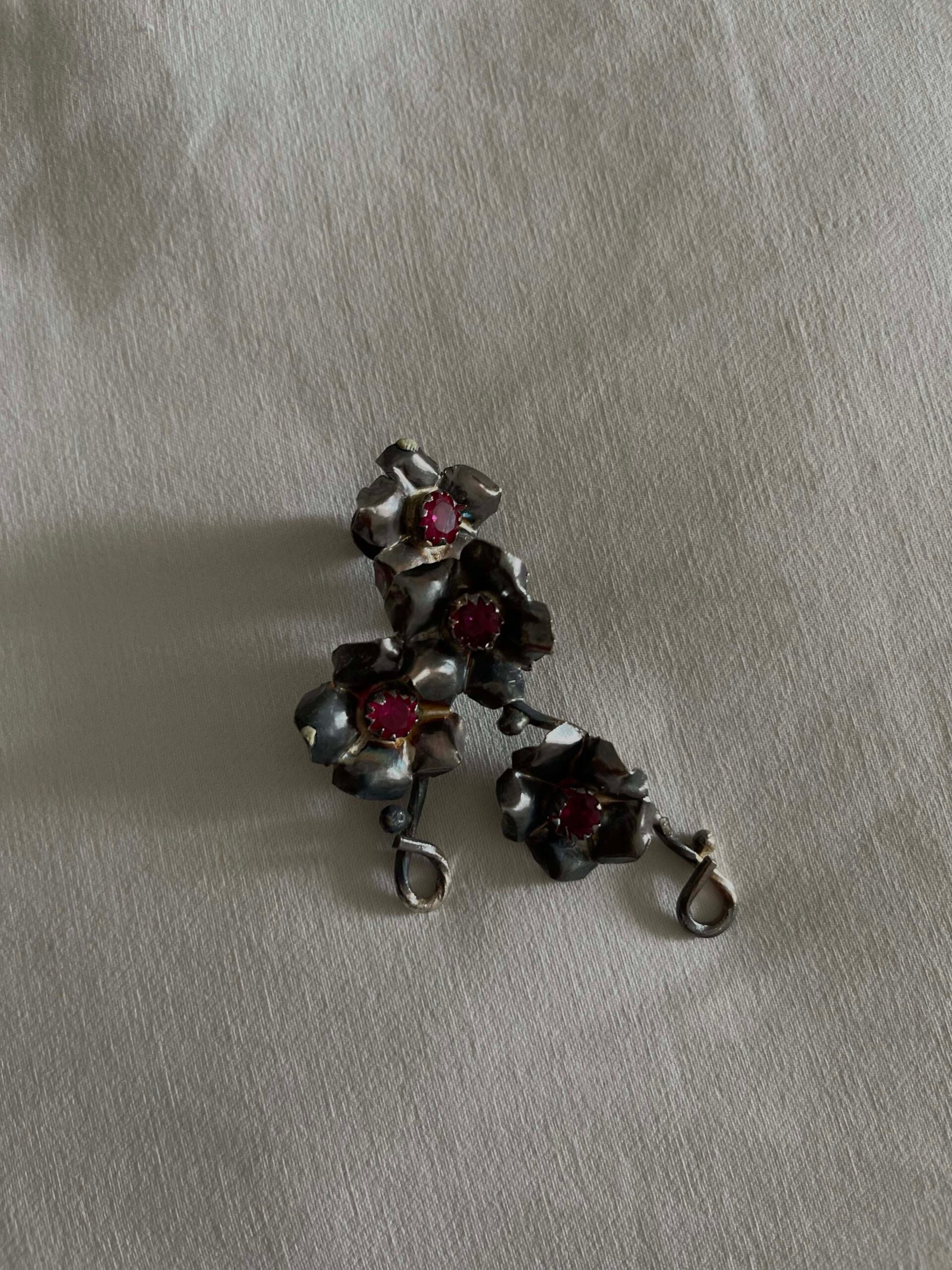 Silver earrings with red stones image 1