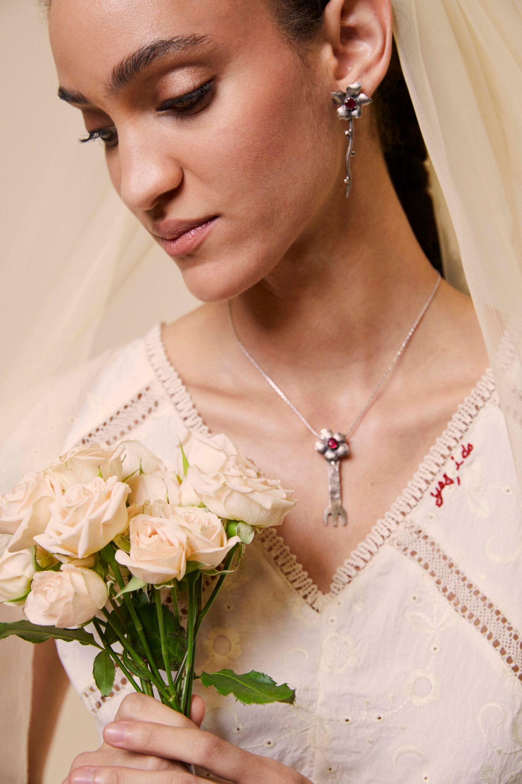 Silver earrings with red stones image 0